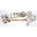 Five assorted variously hallmarked silver mounted dressing table items including an oval hand