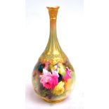 A Royal Worcester hand painted ovoid gilt heightened vase with delicate fluted neck,