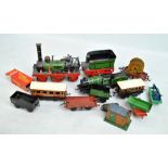 A group of model trains, carriages, tenders and wagons, predominantly Hornby Meccano,
