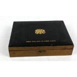 A wooden deed box with tooled leather top bearing impressed gilt royal crest and inscribed 'Edmund