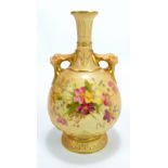 A Royal Worcester blush ivory porcelain vase of globular form with slender waisted neck and