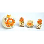 CLARICE CLIFF; a three piece 'Rhodanthe' pattern cruet set (mustard lacking lid),