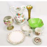 A quantity of decorative ceramics including commemorative ware, a large floral decorated jug,