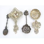 A Dutch pierced silver sifting spoon with shaped bowl and pierced ship handle,
