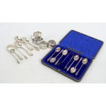 A group of variously hallmarked silver items including a cased set of six apostle teaspoons and