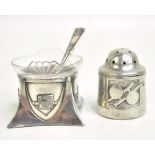ARCHIBALD KNOX; a polished pewter pepper pot with stylised floral decoration,
