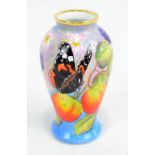 MOORCROFT; a miniature baluster vase with painted enamel flora and fauna decoration and gilt rim,