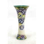 An early Moorcroft McIntyre 'Pansy' pattern trumpet vase signed W Moorcroft and with the McIntyre