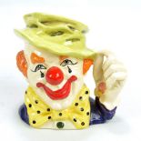 A Royal Doulton character jug; D6834 'The Clown', height 16.5cm.