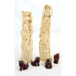 A carved walrus ivory figure of female playing pipa with a demon at her feet, height 31cm,