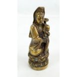 An early 20th century Chinese cast metal figure group of mother holding child,