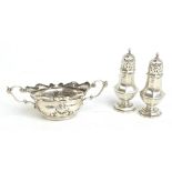 WILLIAM HUTTON & SONS LTD; a pair of George V hallmarked silver peppers of octagonal baluster form,