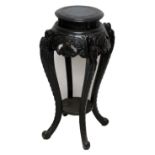 A Chinese carved and ebonised hardwood jardinière stand, height 84cm.