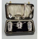 VINER'S LTD; a George VI hallmarked silver three piece cruet set, Sheffield 1938, a napkin ring,