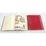 A Simplex stamp album including three penny reds,