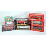 Eight boxed 1:18 scale model cars including Mira 1955 Buick Century and GMC Carryall Suburban 1950,