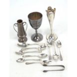 A group of variously hallmarked silver items comprising predominantly Georgian teaspoons including