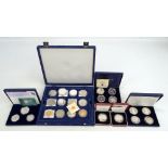 Over twenty Queen Elizabeth II silver coins including three cased sets with commemorative issues