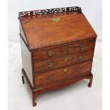 A mahogany bureau of small proportions with galleried top and two short over two long drawers, 93.