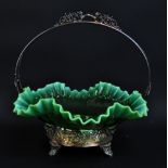 An Edwardian green and vaseline glass detailed basket with wavy crimped rim and electroplated frame