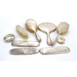 A group of variously hallmarked silver for restoration including a dressing table set,