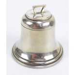 A George V hallmarked silver bell shaped ink well, with clear glass liner and loaded base,