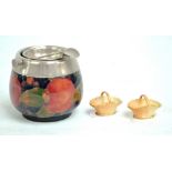 MOORCROFT; a 'Pomegranate' pattern decorated electroplated mounted ash tray with swing bowl,