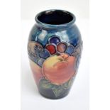 MOORCROFT; a tubeline decorated 'Pomegranate and Finches' pattern inverted baluster vase,