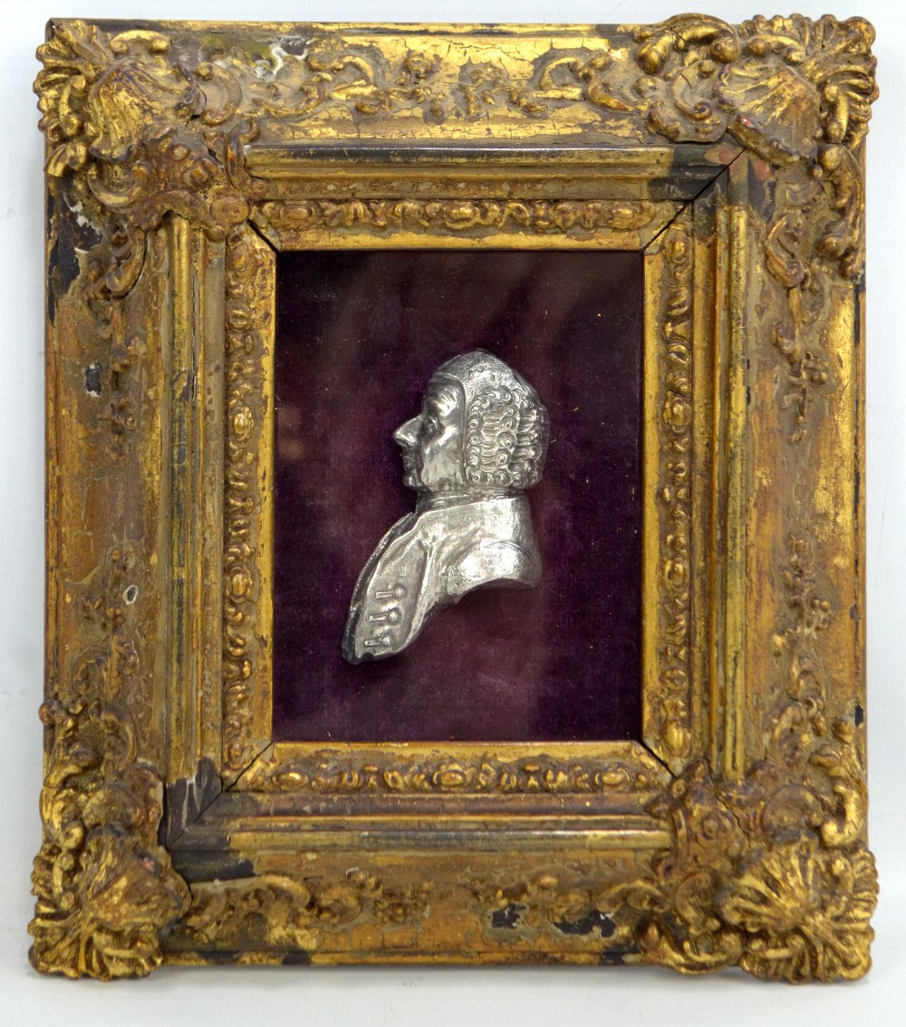 A gilt framed white metal bust portrait of a gentleman, inscribed 'J Herbert fecit', glazed,