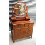 An Edwardian walnut dressing chest,