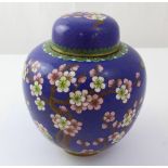 A mid-to-late 20th century Japanese cloisonné blue ground ginger jar and cover decorated with