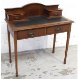 An early 20th century ladies' mahogany desk,