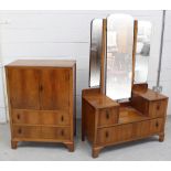 A 1930s walnut tallboy with cupboard over two-drawer base and a matching walnut triptych dressing