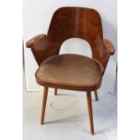 An early-to-mid 20th century bent laminate armchair designed for Ligna by Oswald Haerdtl,