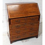 An Edwardian mahogany inlaid bureau,