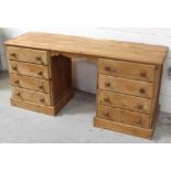 A modern pine pedestal desk with planked top and sides, 71 x 154 x 49cm.