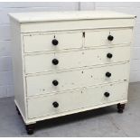 A Victorian mahogany chest of two-over-three drawers, on turned onion feet, later painted in white,