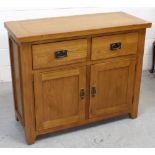 A modern oak sideboard, two drawers over two cupboard doors, 86 x 105cm,