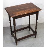 A 20th century oak hall table on wrythen supports and cross stretchers, width 57cm.