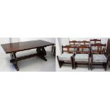 A reproduction hardwood 17th century Spanish-style rectangular dining table with metal stud