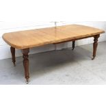 A Victorian-style mahogany extending dining table with extra leaf, length when extended 227cm.