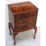 A reproduction mahogany three-drawer bedside cabinet, width 44cm.