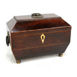 A Regency rosewood sarcophagus two section tea caddy with bone escutcheon,