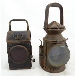 Two WWII period railways lamps, one dated 1941 by SNLW Ltd, height 24cm including handle (2).