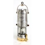 E THOMAS & WILLIAMS LTD OF ABERDARE; an aluminium and brass miner's safety lamp, type number 30,