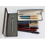 A cased Waterman fountain pen and propelling pencil set with 14ct gold nib and rolled gold caps,