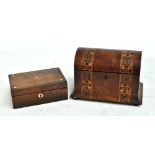 A Victorian walnut and geometrically band inlaid dome topped two division tea caddy and a small