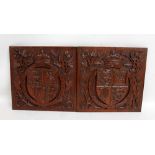 Two carved mahogany panels, both with royal coat of arms, 'VR' and national flowers in relief,