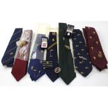 A collection of military aviation buttons, badges, stick pins and ties,