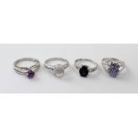 Four 9ct white gold ladies' dress rings to include an amethyst-set ring, size M 1/2,